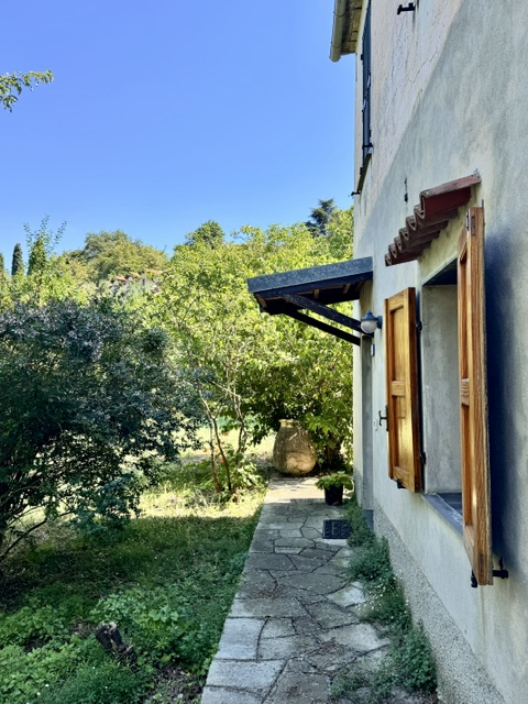 Part of a house with garden