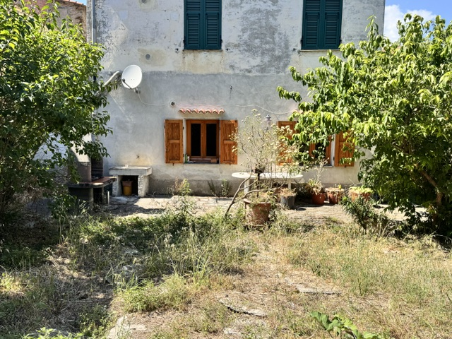 Part of a house with garden