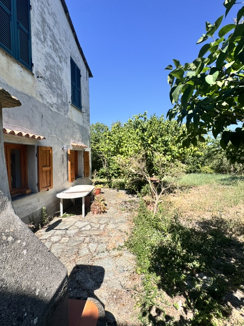 Part of a house with garden