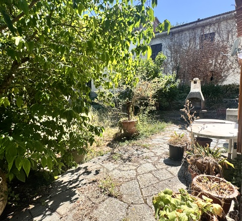Part of a house with garden