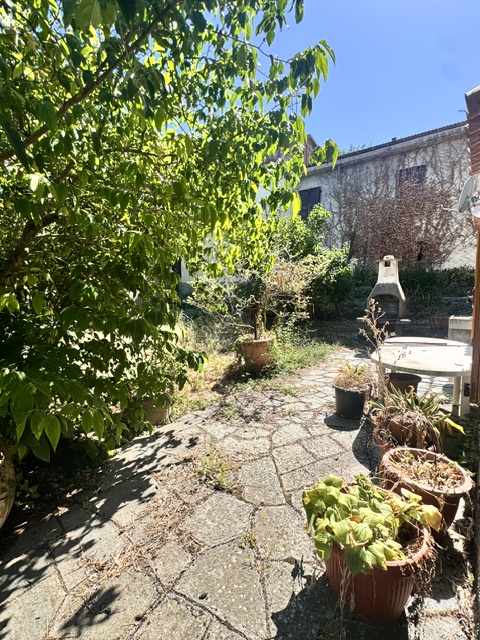 Part of a house with garden