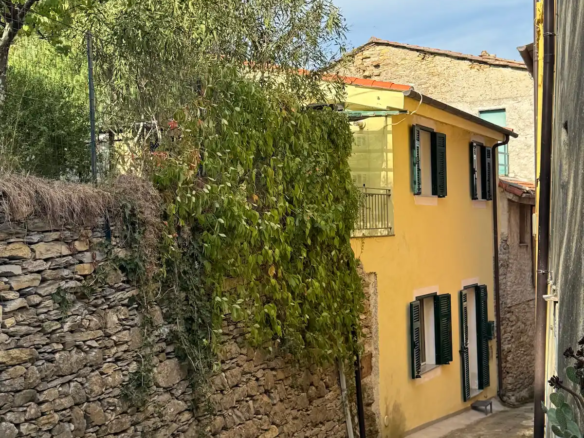 Restored house with garden and parking space