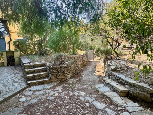 Restored house with garden and parking space