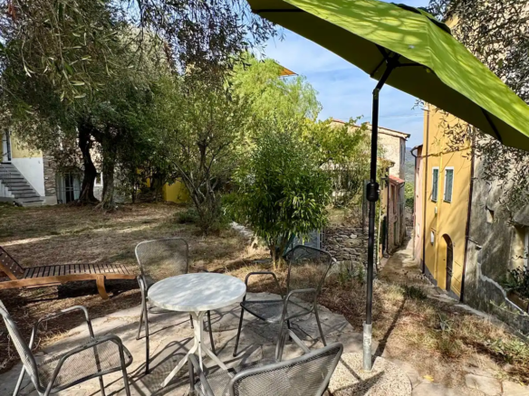 Restored house with garden and parking space